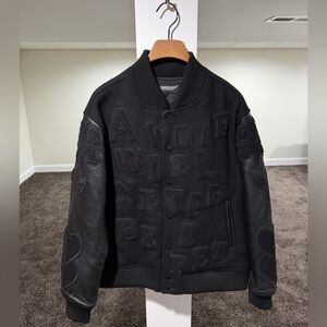 Undercover Chaos All Black A Wolf Will Never Be A Pet Varsity Jacket